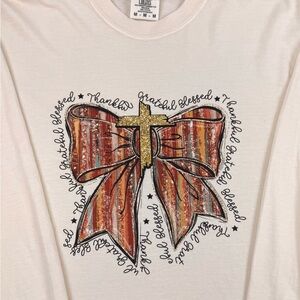 Graphic Tee with Bow and Cross Design